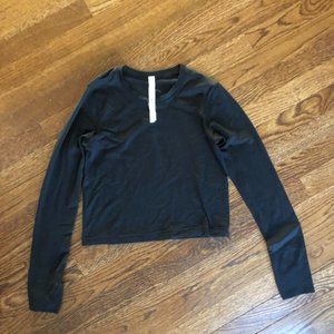 Lululemon cropped black long sleeve wunder train
